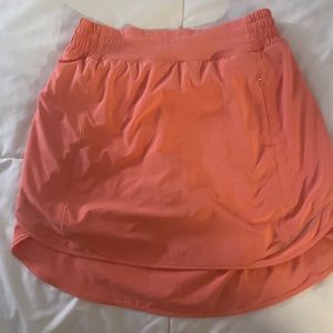 Lululemon hotty hot tennis skirt- coral- size 8